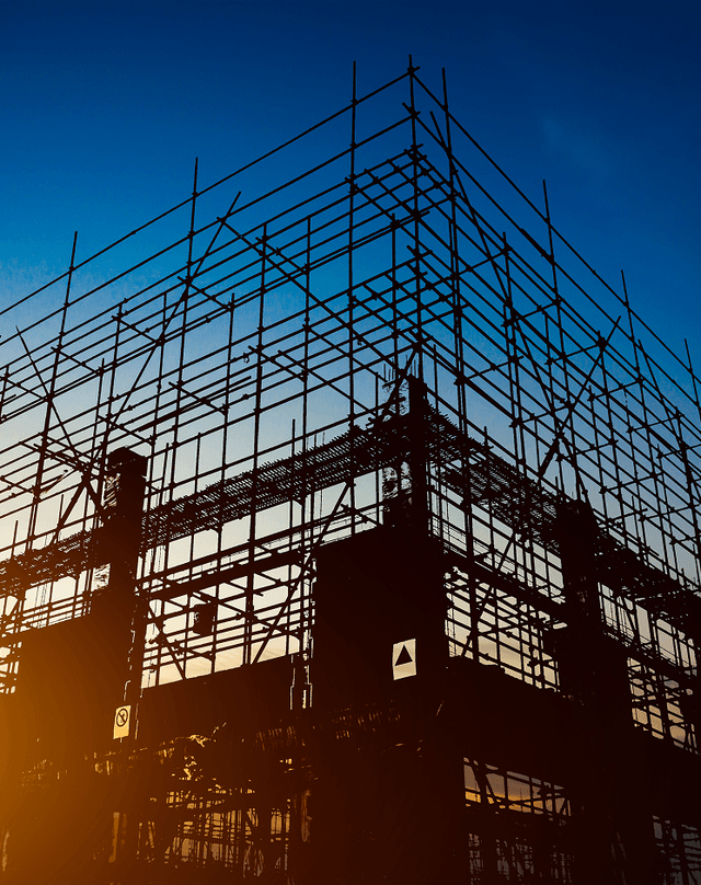 Scaffolding against sunset