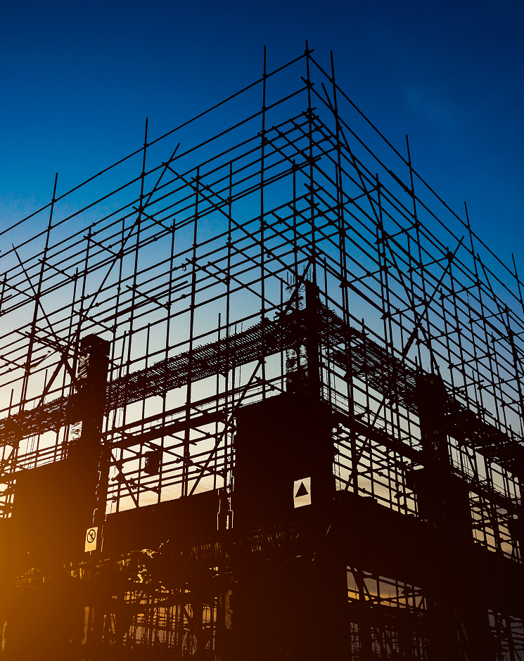 Scaffolding against sunset
